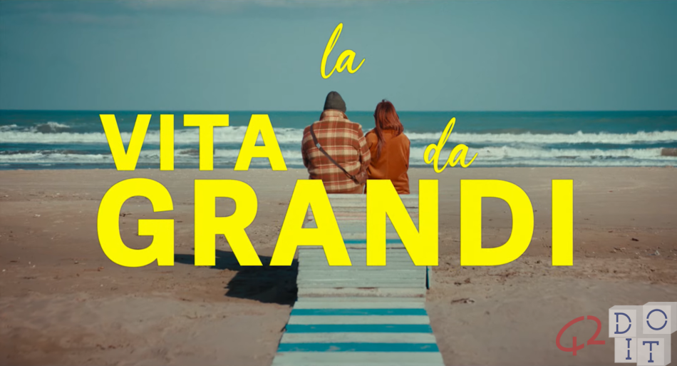 Una locandina de "la vita da grandi"